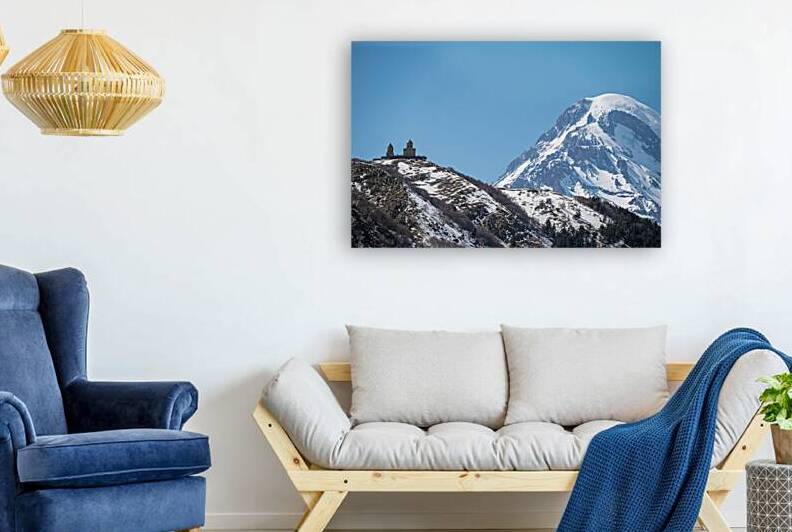 Gergeti Trinity Church and Mount Kazbek near the village of Stepantsminda in the Caucasus mountains in Georgia by Mirko Kuzmanovic