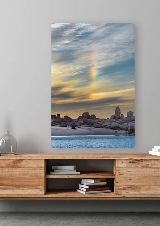Serene Beach with Rainbow Sunset and Rocky Formations by Mirko Kuzmanovic