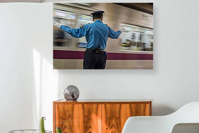 Platform attendant Oshiya working in Tokyo Metro Subway Japan by Mirko Kuzmanovic