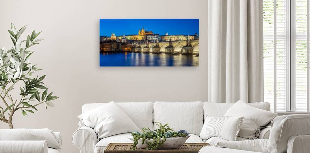 Panoramic night view of the iconic Charles Bridge over Vltava river and Prague Old town cityscape in Prague Czech Republic by Mirko Kuzmanovic