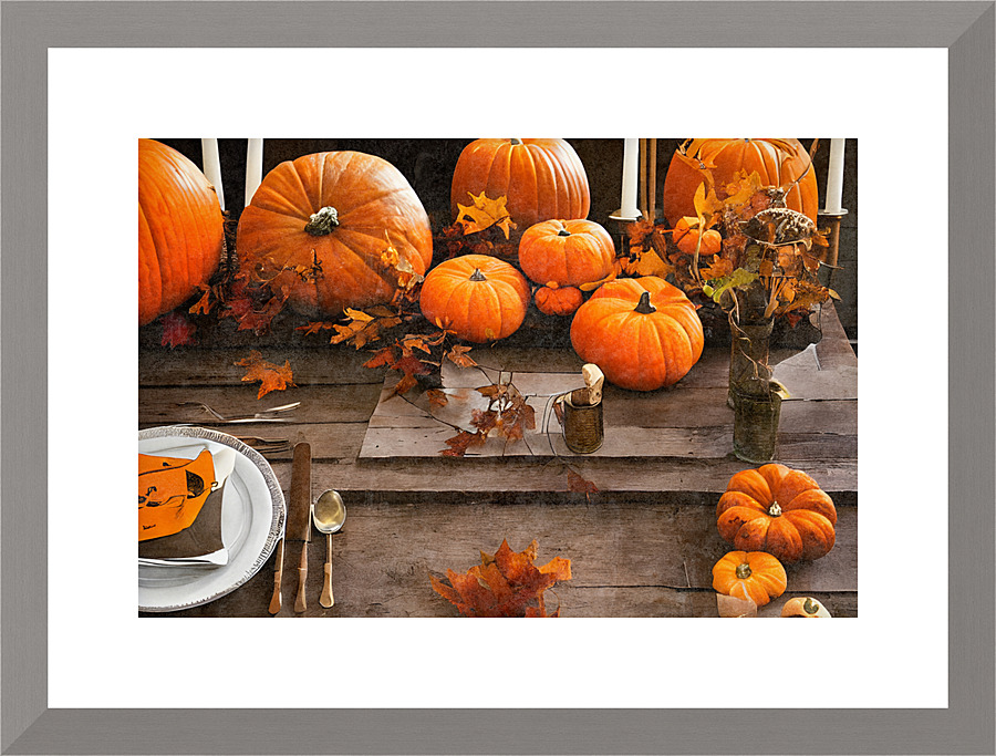 Orange pumpkins on table Picture Frame print