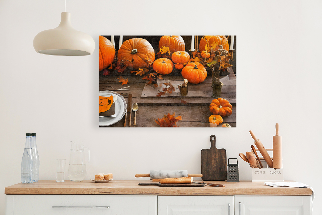 Orange pumpkins on table Reproduction