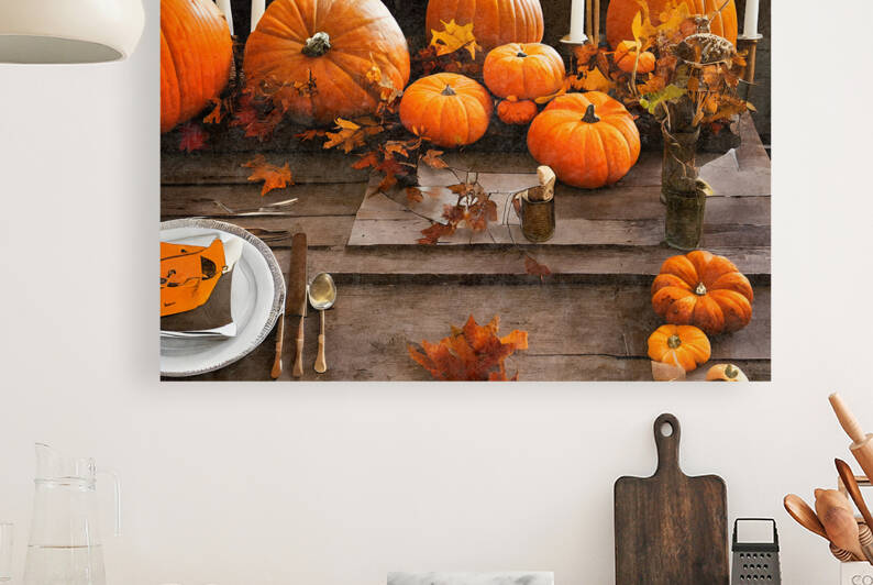 Orange pumpkins on table by Thevectoryfloor