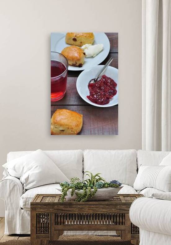 Close-up of breakfast with tea scones and marmalade on wooden table by Thevectoryfloor