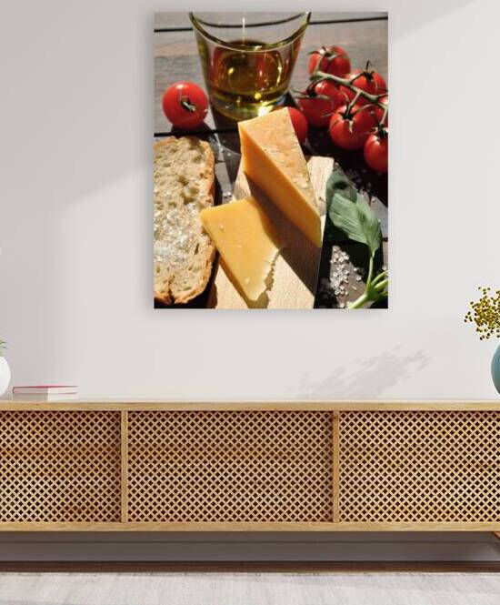 High angle view of Parmesan cheese and tomatoes on wooden table by Thevectoryfloor