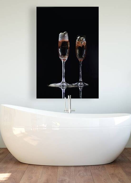 Close-up of two champagne glasses with pink champagne on black background by Thevectoryfloor
