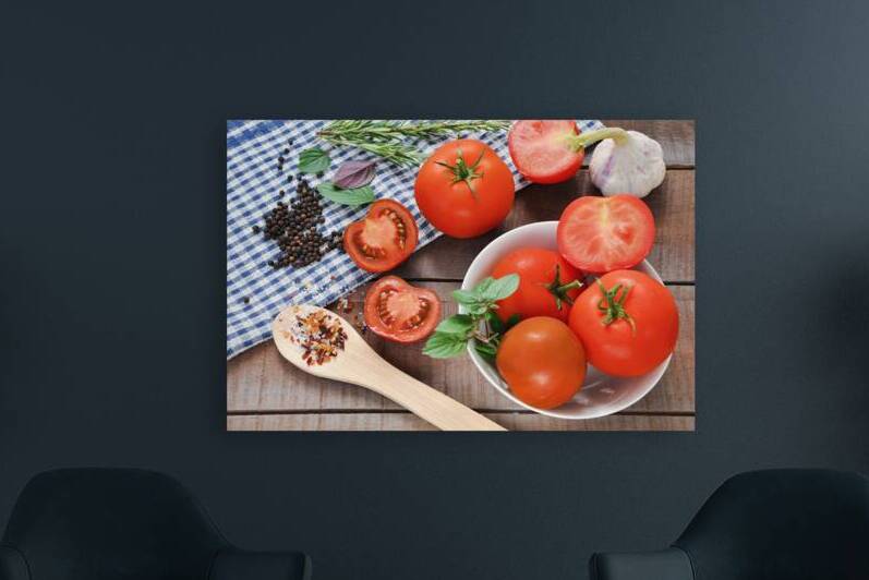 High angle view of tomatoes and basil on wooden table by Thevectoryfloor