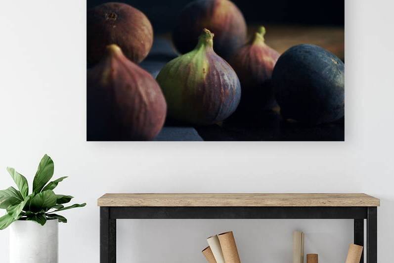 Close-up of fresh figs on dark background by Thevectoryfloor