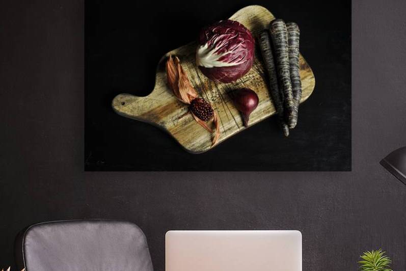 Directly above shot of multi colored vegetables on cutting board on black background by Thevectoryfloor