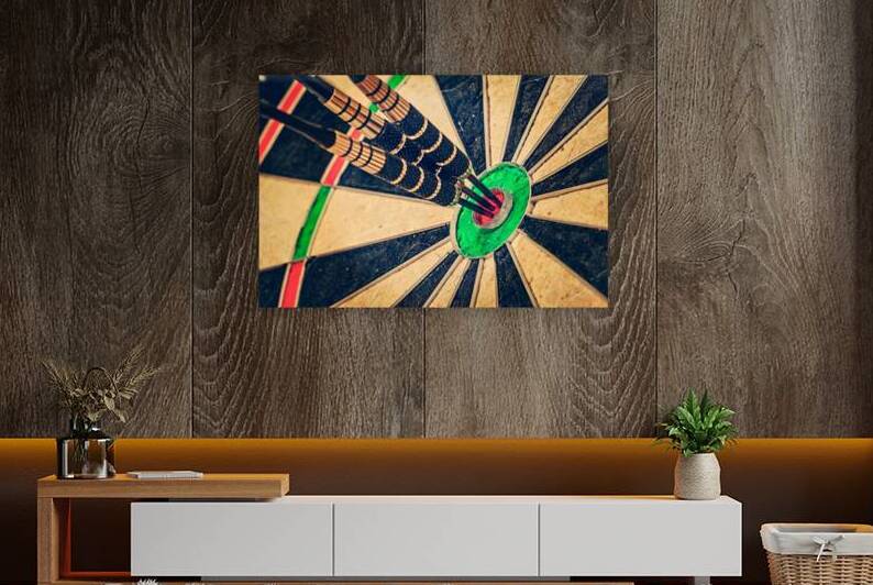 Three darts in bulls eye close up by Dmitry Rukhlenko