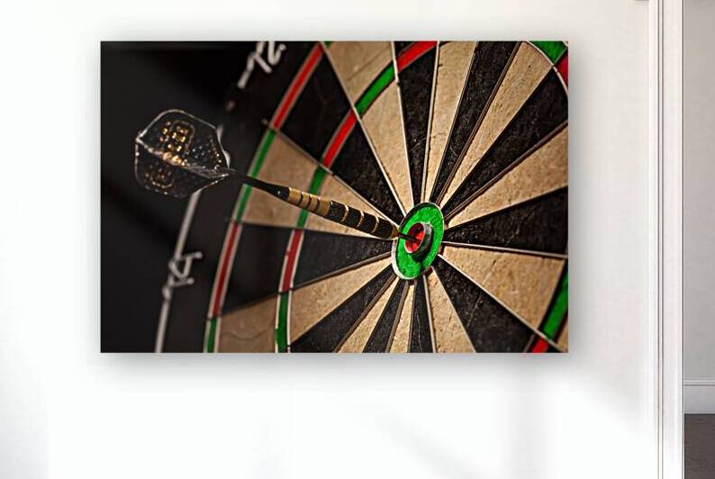 Dart in bulls eye close up by Dmitry Rukhlenko