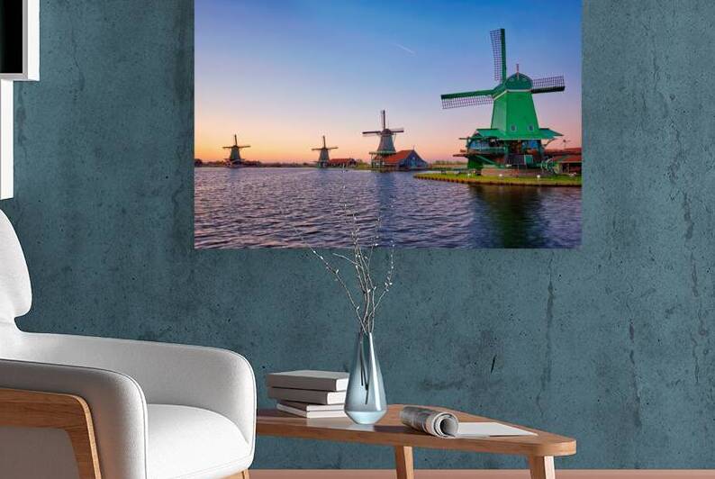 Windmills at Zaanse Schans in Holland on sunset. Zaandam Netherlands by Dmitry Rukhlenko