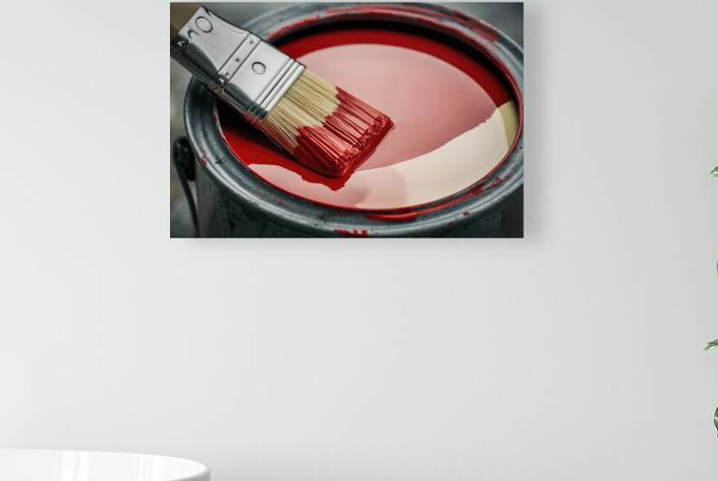 A close up artistic shot of a paintbrush with red by Raluca Ciobanu