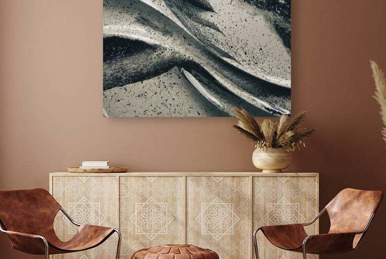 A textured surface predominantly white with speck by Raluca Ciobanu