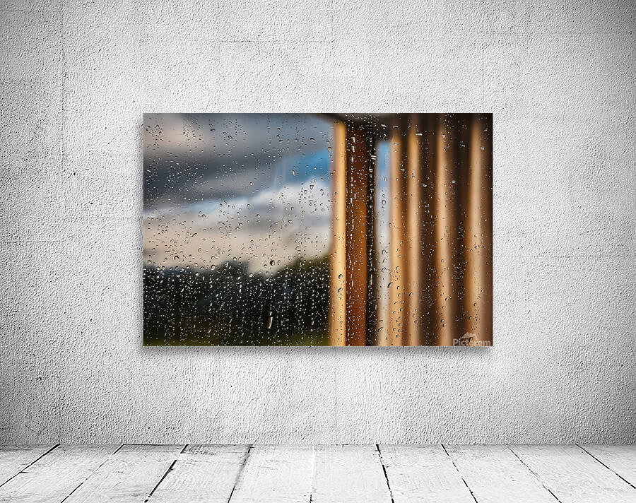 raindrops gently cascading down a windowpane Wall Preview
