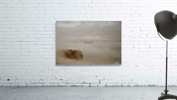 Mesa Edge Pushing Through Clouds Wall Preview