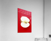 Half An Apple On Red Background Acrylic Print
