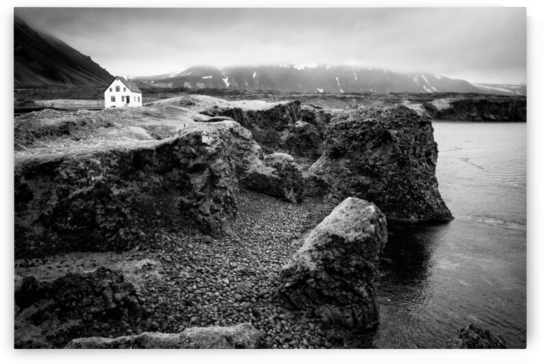 Solitary house at Arnarstapi coast Iceland black and white by Matthias Hauser