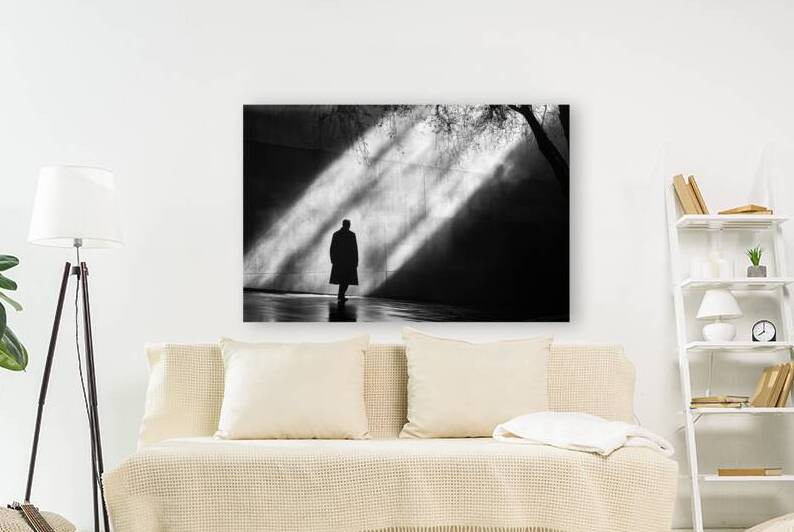 Lone Figure in Light and Shadow by Matthias Hauser