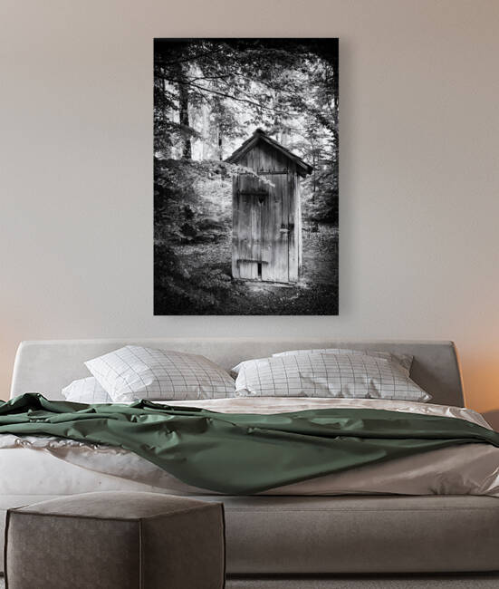 Outhouse in the forest black and white by Matthias Hauser