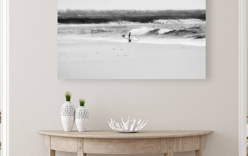 Solo surfer winter beach day by Marco Sales