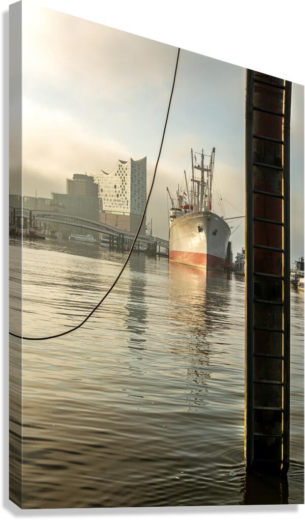 Cap San Diego and Elbphilharmonie at St. Pauli Landungsbrücken pier at the Elbe River in Hamburg Germany Canvas Print