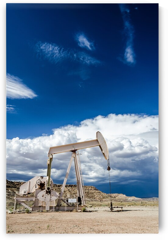 Oil pump in the desert in the US Southwest by caladoart