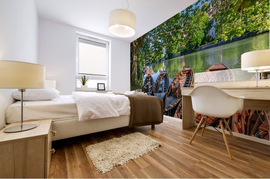 Traditional punt boats Stocherkahn at the pier at the Neckar River in Tübingen Germany Mural print