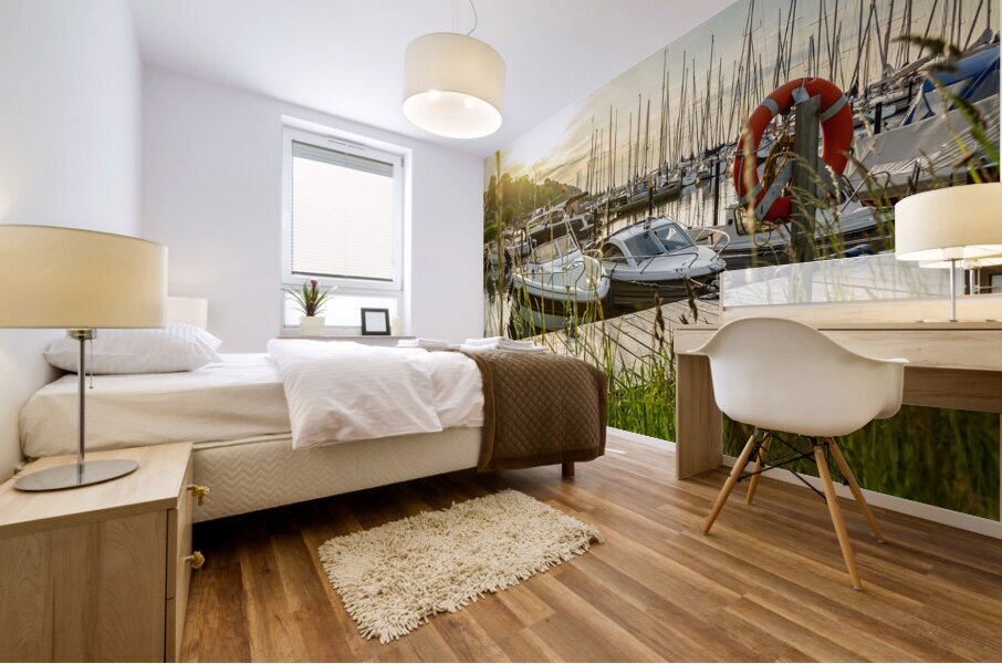 Sunset over pier and marina in Langballigau at the Baltic Sea in Northern Germany Mural print