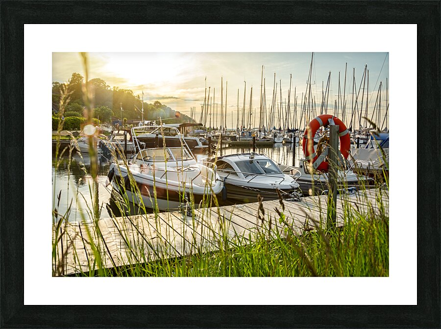 Sunset over pier and marina in Langballigau at the Baltic Sea in Northern Germany Picture Frame print