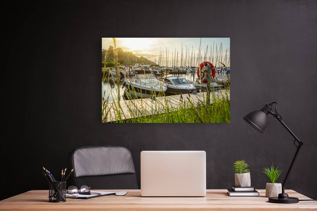 Sunset over pier and marina in Langballigau at the Baltic Sea in Northern Germany Reproduction