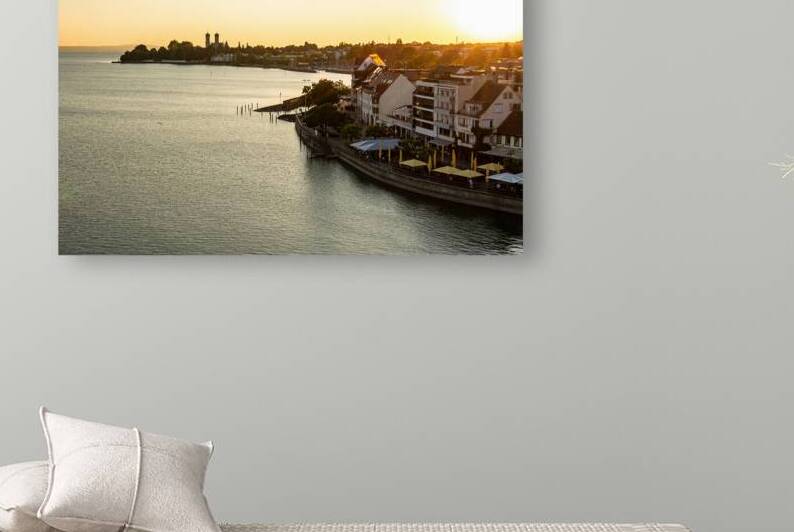 Golden sunset over Friedrichshafen at Lake Constance in Southern Germany by caladoart