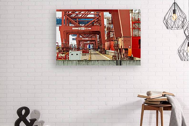 Closeup view of gantry cranes at the Eurogate container terminal in Hamburg Germany by caladoart