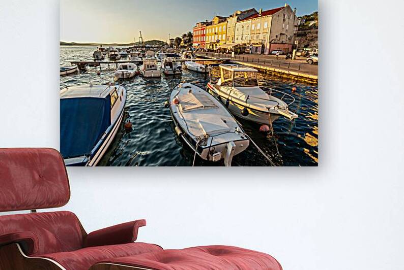 Boats in the marina of Mali on the island of Losinj in the Adriatic Sea in Croatia during beautiful sunset by caladoart