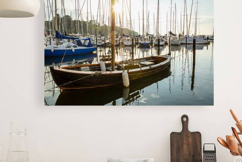 Historic sailboat in a marina Langballigau at the Baltic Sea in Northern Germany by caladoart
