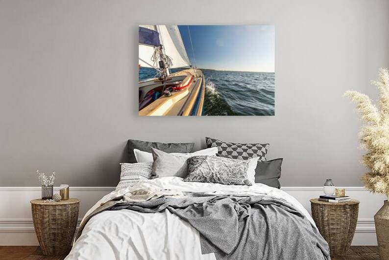 View from a sailing yacht sailing on the choppy Baltic Sea on a beautiful summer day by caladoart