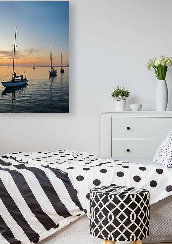 Sailing boats coming back into the harbour during beautiful sunset at the Baltic Sea in Northern Germany by caladoart