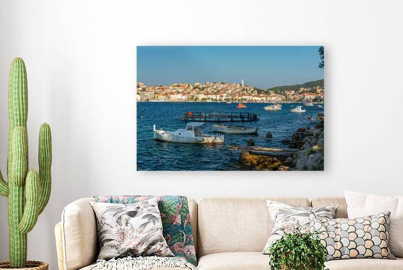 Beautiful rugged coastline and boats near Mali on the island of Losinj in the Adriatic Sea Croatia by caladoart