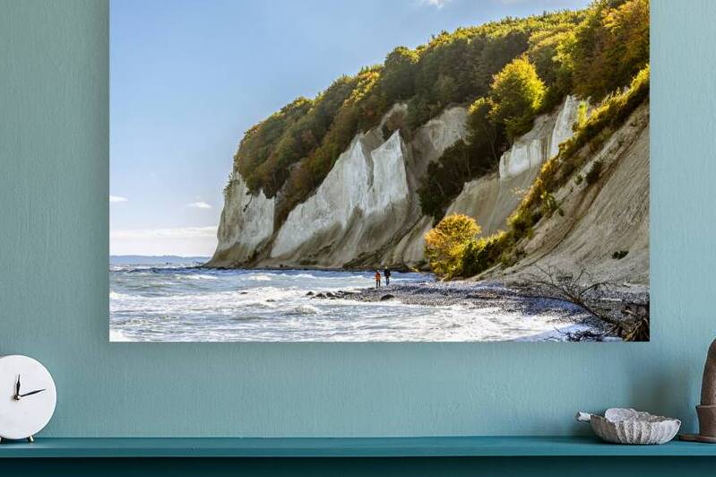 People hiking in front of the famous white chalk cliffs on the island of Rügen in Germany by caladoart