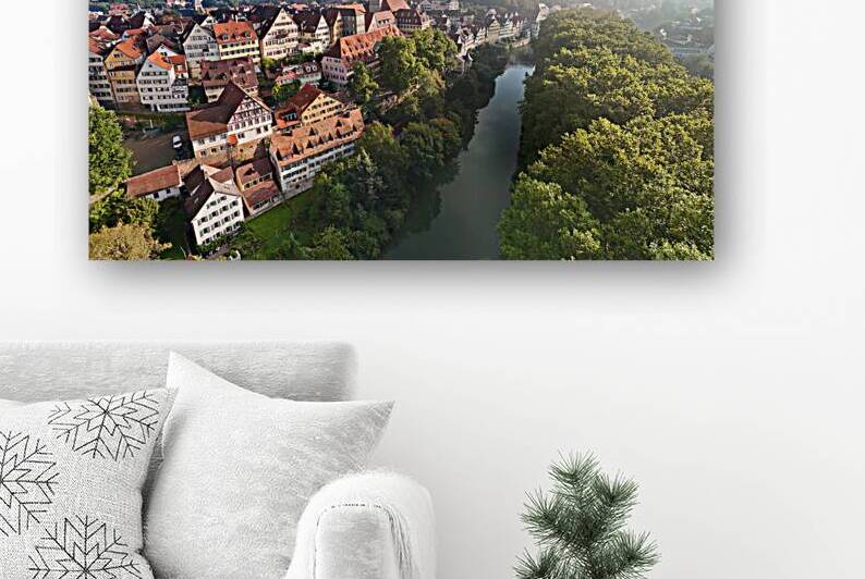 Aerial view of the historic old town of Tübingen and the Neckar River in the morning fog by caladoart