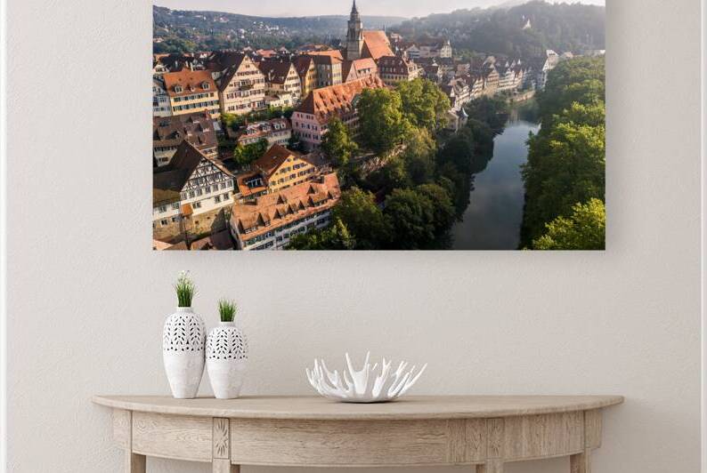Aerial view of the old town of Tübingen and the Neckar River in the morning fog by caladoart