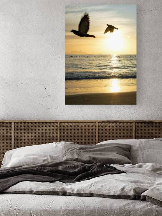 Birds and people on surf boards at the Copacabana Beach in Rio de Janeiro in Brazil at sunrise by caladoart