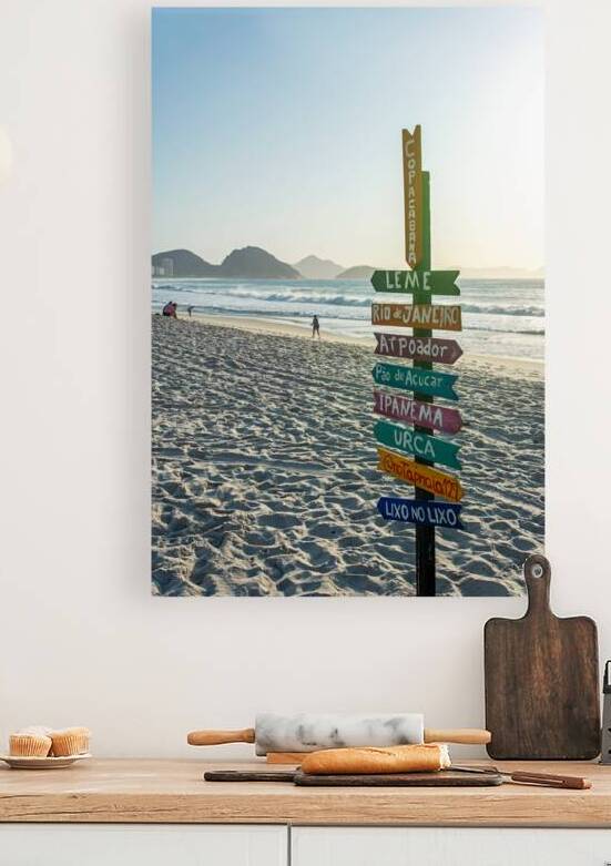 Signpost at Copacabana Beach in Rio de Janeiro in Brazil at sunrise  by caladoart