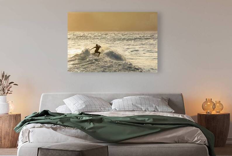 Surfer riding the waves at sunset at Ipanema Beach in Rio de Janeiro in Brazil by caladoart
