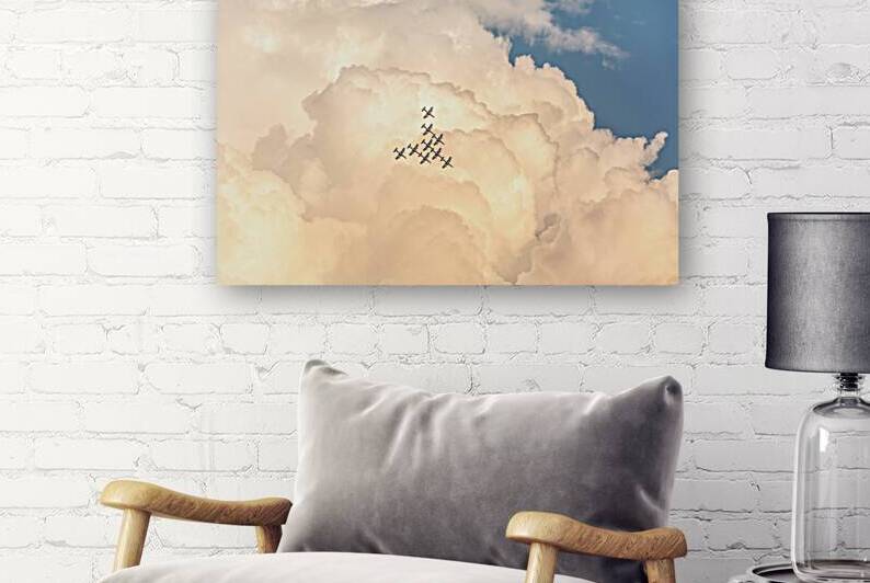 Fighter jets flying in a triangle formation during airshow in scenic clouds by caladoart