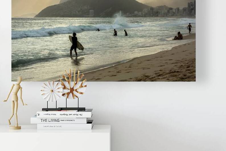 Surfer walking into the ocean at Ipanema Beach in Rio de Janeiro in Brazil at sunset by caladoart