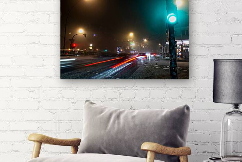Long exposure night shot of a lit up streetcorner in Hamburg Altona by caladoart