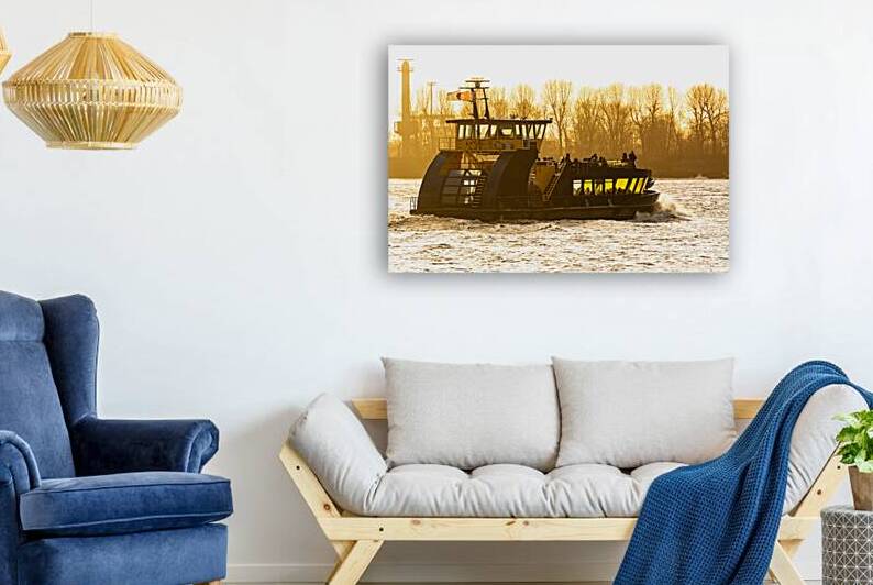 Closeup shot of ferry on the Elbe River in Hamburg during golden sunset  by caladoart
