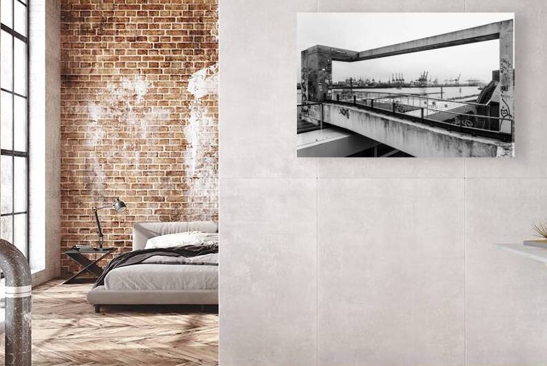 Black and white shot of the Elbe River in Hamburg seen through concrete arch by caladoart