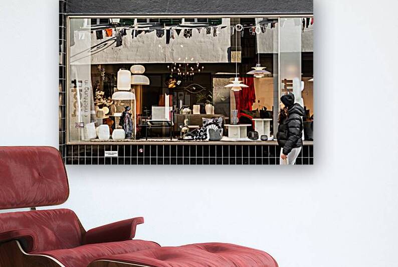 Street photo of reflections in a stylish furniture shop window in the city by caladoart